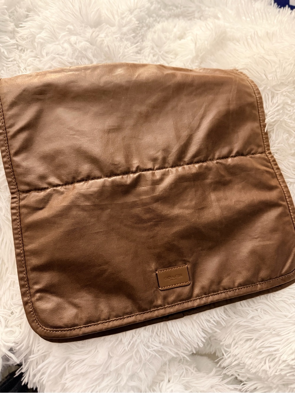 Coach diaper changing pad